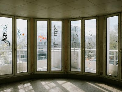 Sunlight streaming through a window onto a fitness mat